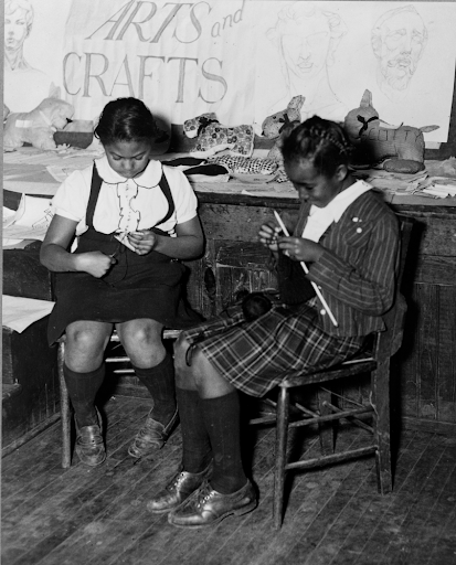 "Girls engaged in knitting and making toy animals in the handicraft class of the St. Simon’s Youth Center of the National Youth Administration, Philadelphia, Pennsylvania, 1941. Library of Congress Prints and Photographs Division."